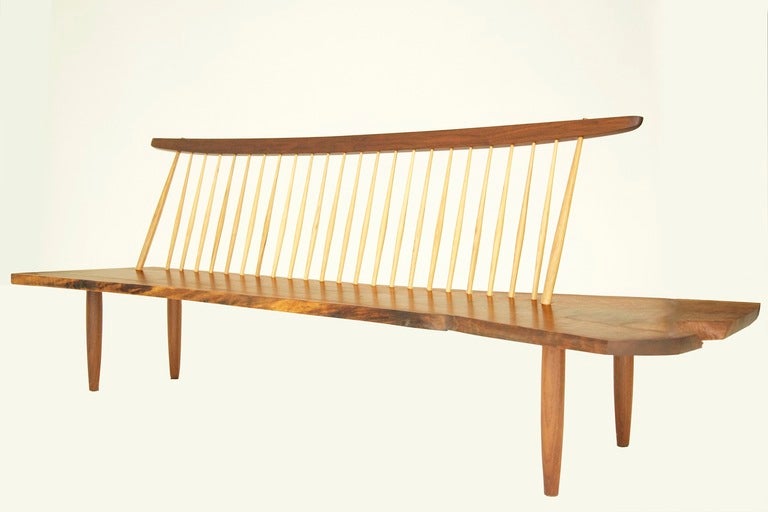 Conoid Bench, Fine figured black walnut slab with hickory spindles.