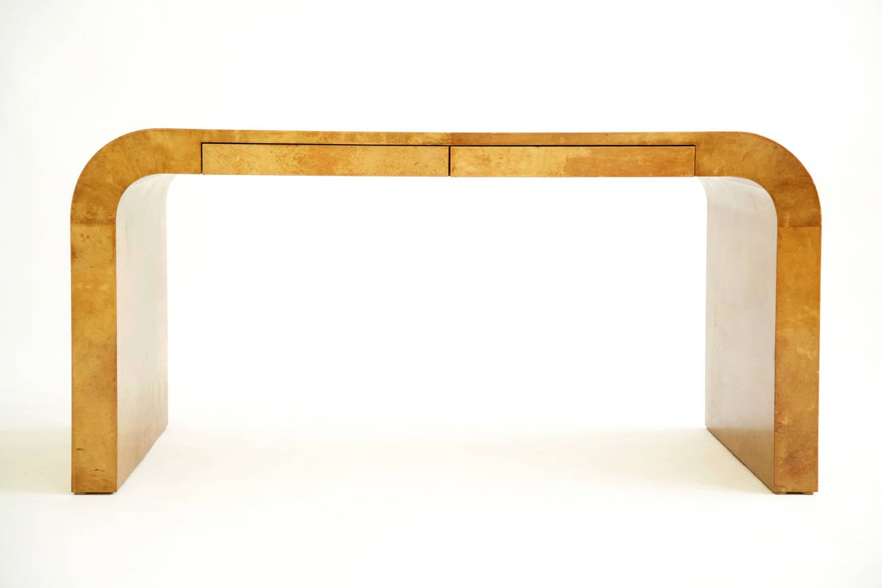 Springer for Springer L.T.D. goatskin covered desk or writing table.
Continuous water fall design with two pencil drawers.
[stamped 1984]