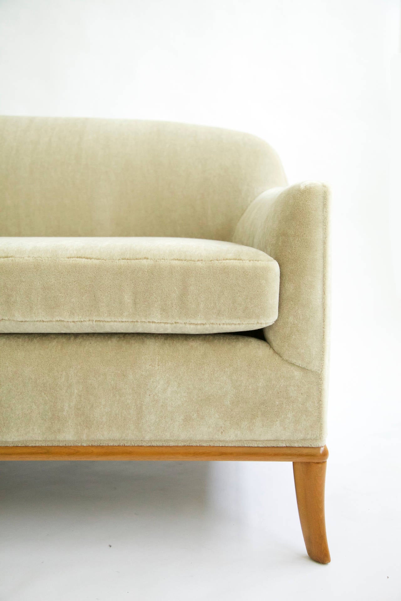 Robsjohn-Gibbings for Widdicomb saber leg sofa.
Recovered in plush mohair. 
Walnut legs.