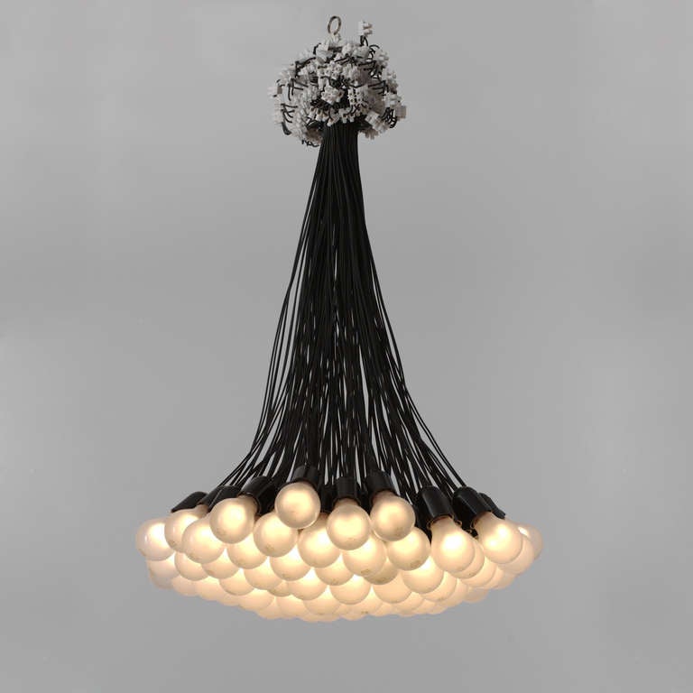 Rody Graumans for Droog This Chandelier was one of Droog Design's
Gathered in a unified bundle at the ceiling, the cords flare out to accommodate the mass of bulbs.