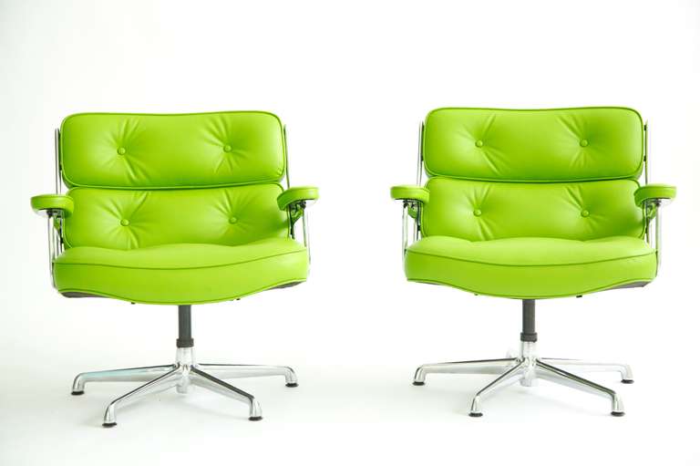 Eames for Herman Miller Pair of Time Life Swivel Lounge Chairs. Model ES105
reupholstered in lime green Spinneybeck leather.
 These Lounges are no longer in production. Eames executive chairs in 1960 to grace the lobbies that they designed for the