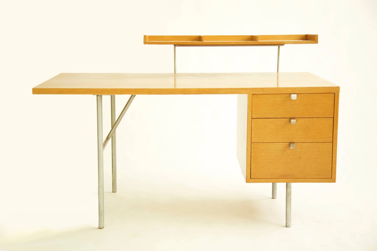 Nelson for Herman Miller single three-drawer pedestal desk with over-desk letter tray. The letter tray floats above the desk top, 9.5
