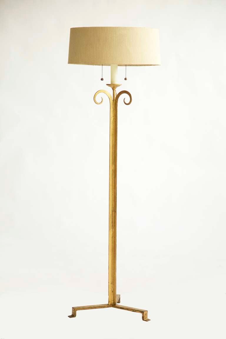 Masion Ramsay Gilt over wrought iron floor lamps. 
Classic 