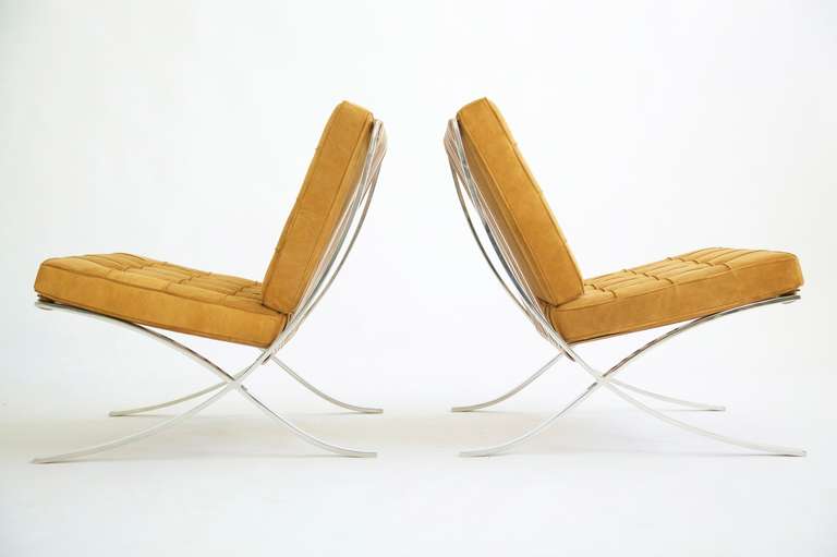 Ludwig Mies van der Rohe pair of Barcelona chairs in tan spinneybeck suede.
