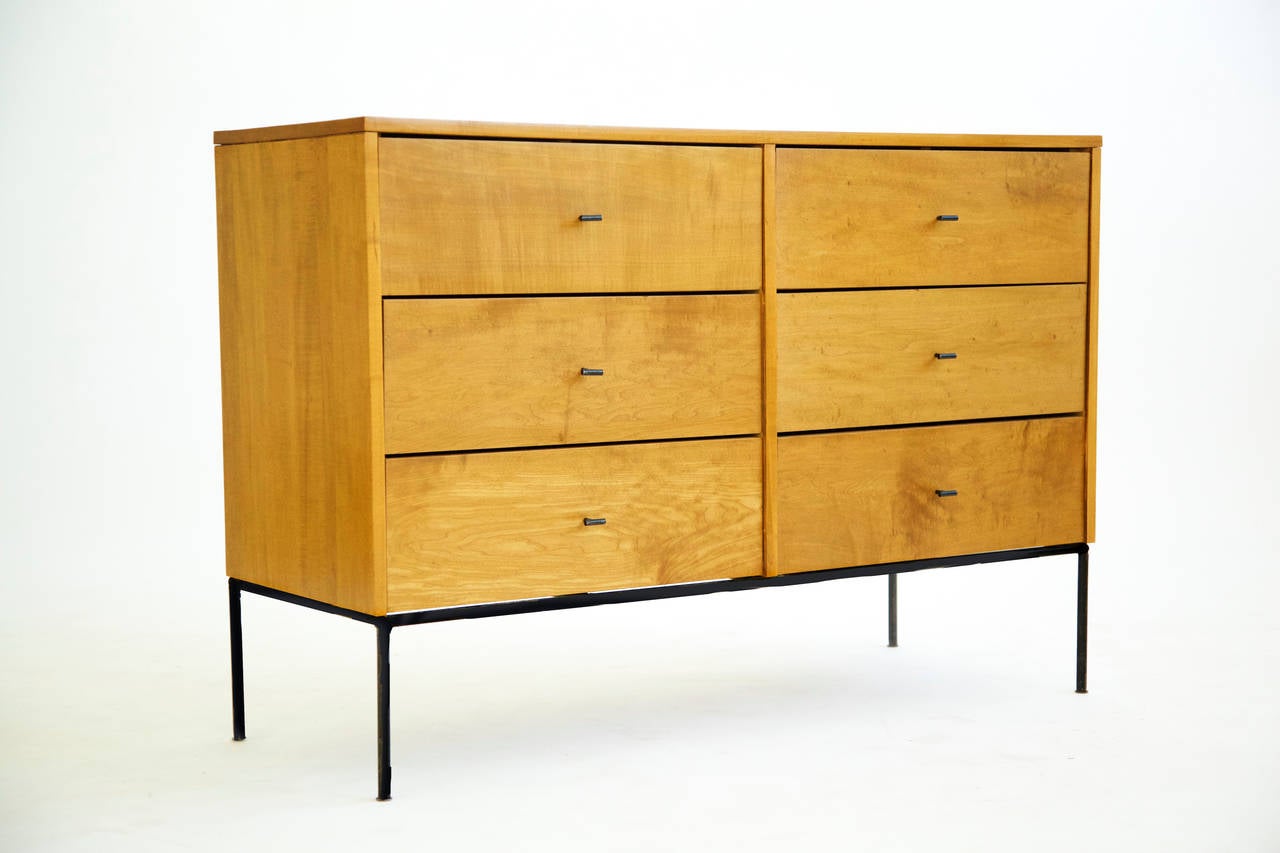 Early Paul McCobb Planner Group six drawer dresser. Solid maple case with wrought iron base and rare T pulls.