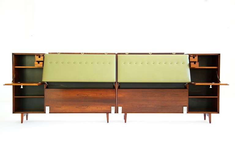 GEORGE NELSON & ASSOCIATES for Herman Miller; Rosewood Thin Edge Headboard, each headboard features adjustable headrest with flip-top storage compartment and drop-front door with 2 small drawers.