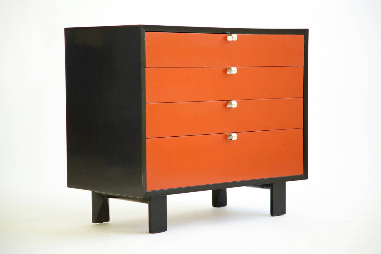 Nelson for Herman Miller pair of dressers, model #4606 with original coral lacquered fronts, four drawer units with 