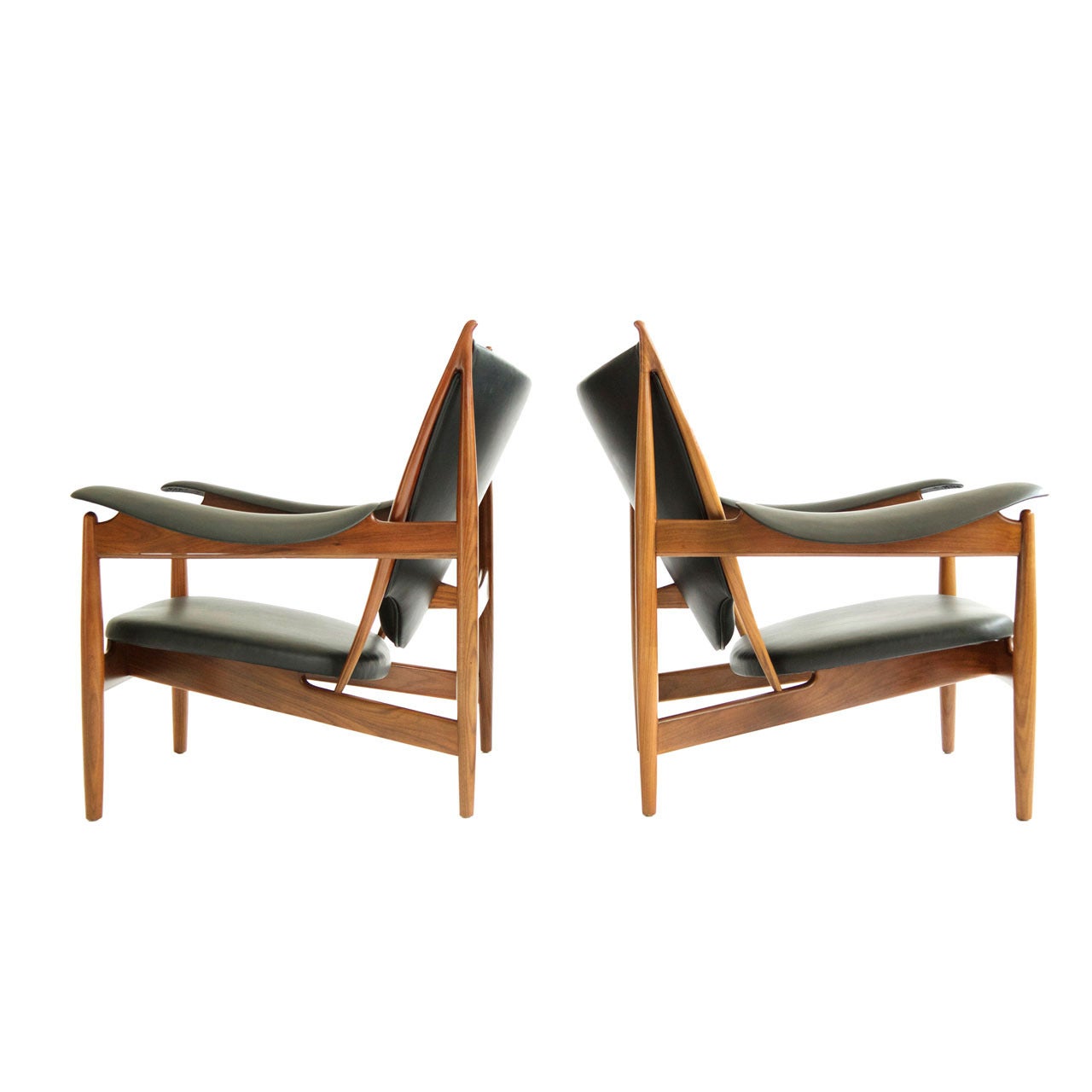 Finn Juhl Chieftan Lounge Chairs, circa 1999 in the style of Mid Century Modern