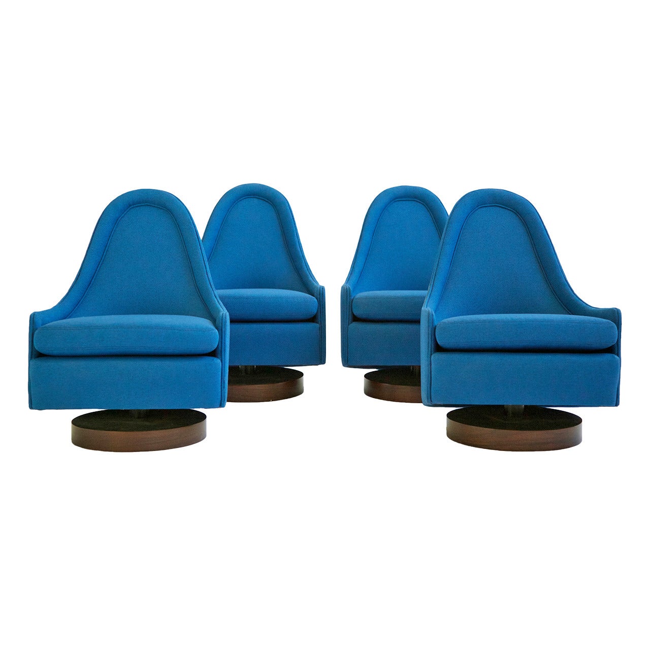 Four Milo Baughman Swivel Lounge Chairs