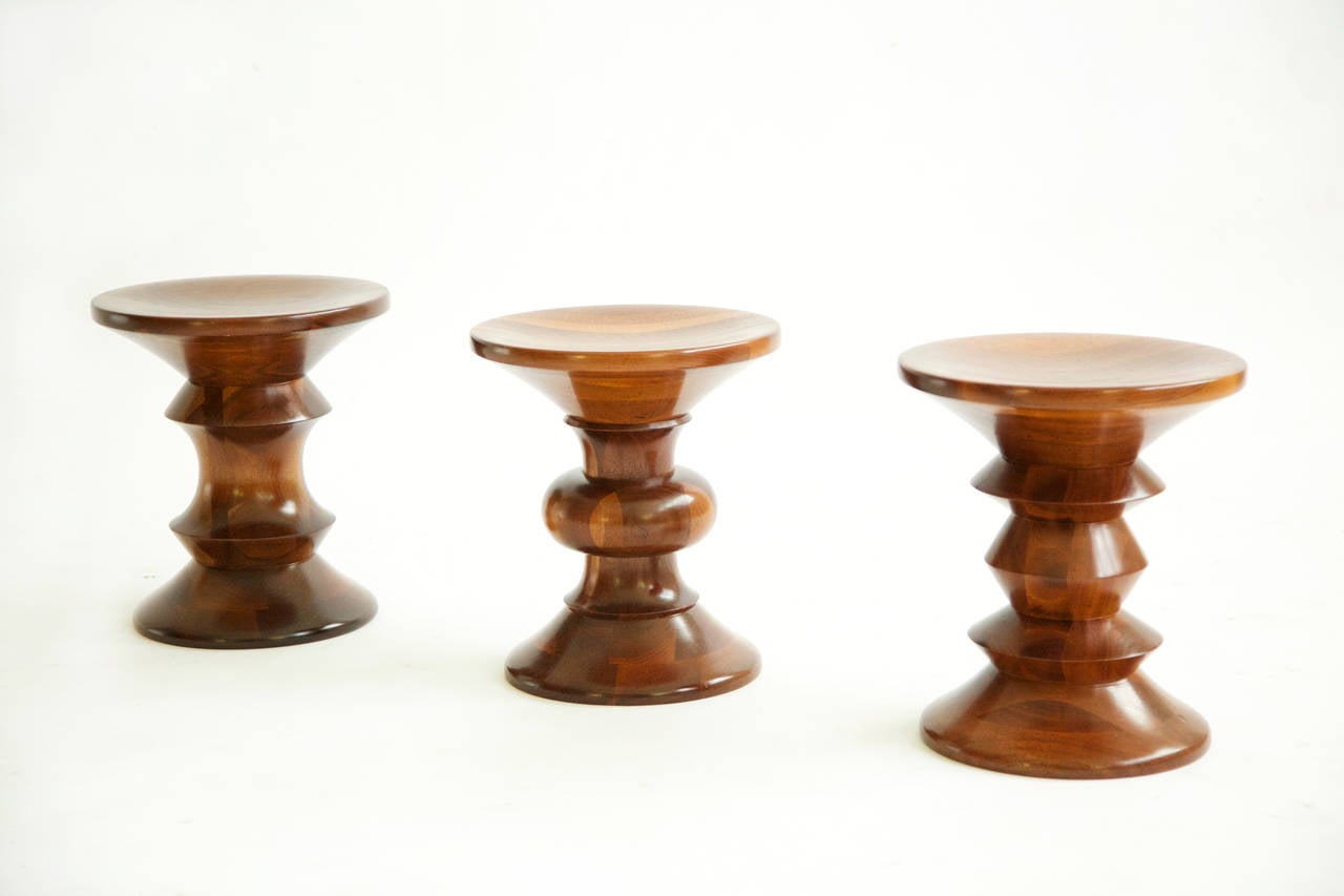 Eames for Herman Miller Time-Life stools, Originally designed for the Time & Life building lobby to serve as low tables or seats.
Three different profiles, shown here as a original matched set from one owner.
Solid turned walnut process. Several