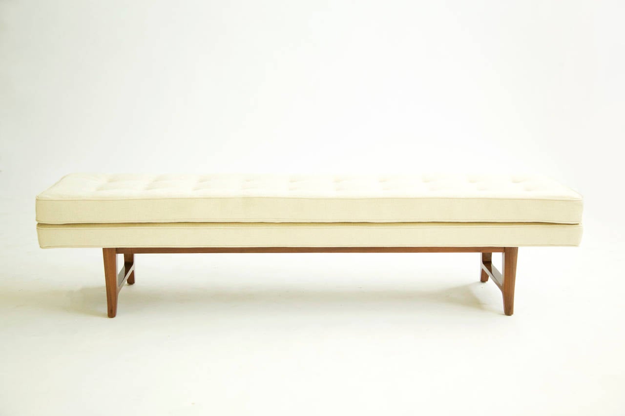 Wormley for Dunbar Janus Collection tufted bench, model #5766.
Reupholstered with Great Plains cotton blend, top layer is fixed.
Splayed sculpted walnut legs.
[Signed gold metal tag Dunbar Berne Indiana].