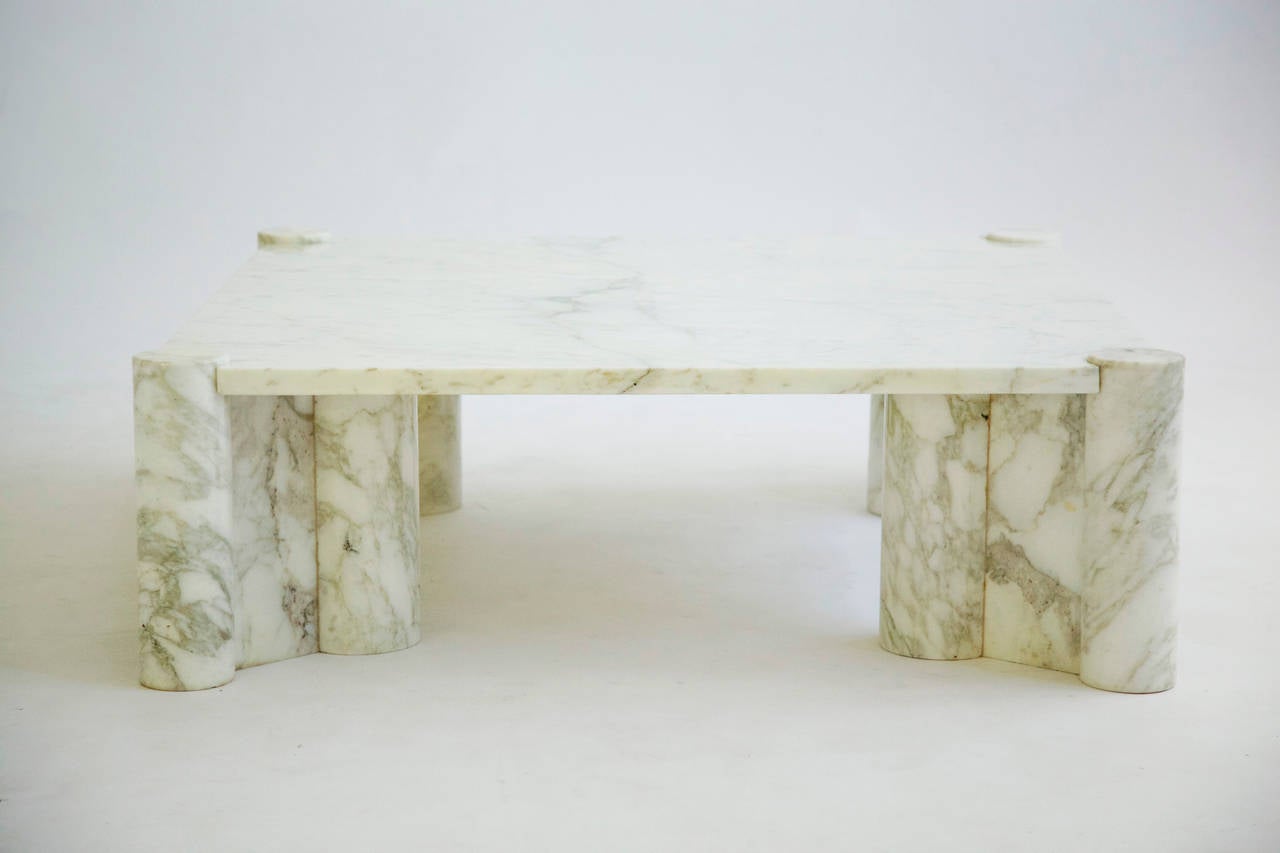 Gae Aulenti for Knoll International, Jumbo coffee table.
Four architecturally designed Carrara marble cylindrical double pillar supports secures one inch thick matching Carrara slab via gravitational.
Image 8 showing bird's-eye view vignette in