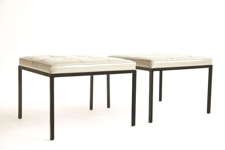 Weinberg for Weinberg MFG. Pair of steel tubular ottomans.
recovered with a soft buttery silver-grey leather.