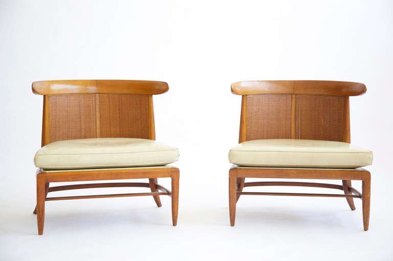 Lounges by Tomlinson, generous curved head rail with caned back, rear saber legs.