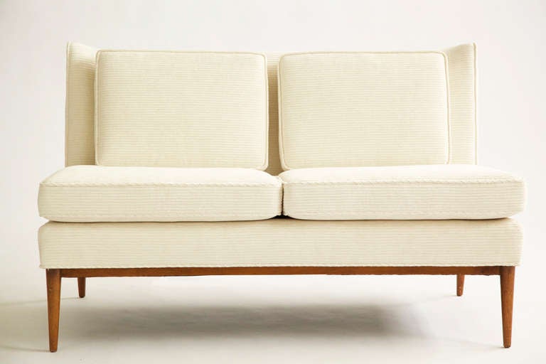 McCobb for Directioal Curved Back Settee.
Reupholstered with GreatPlains fabric with birch wood base and tapered legs.