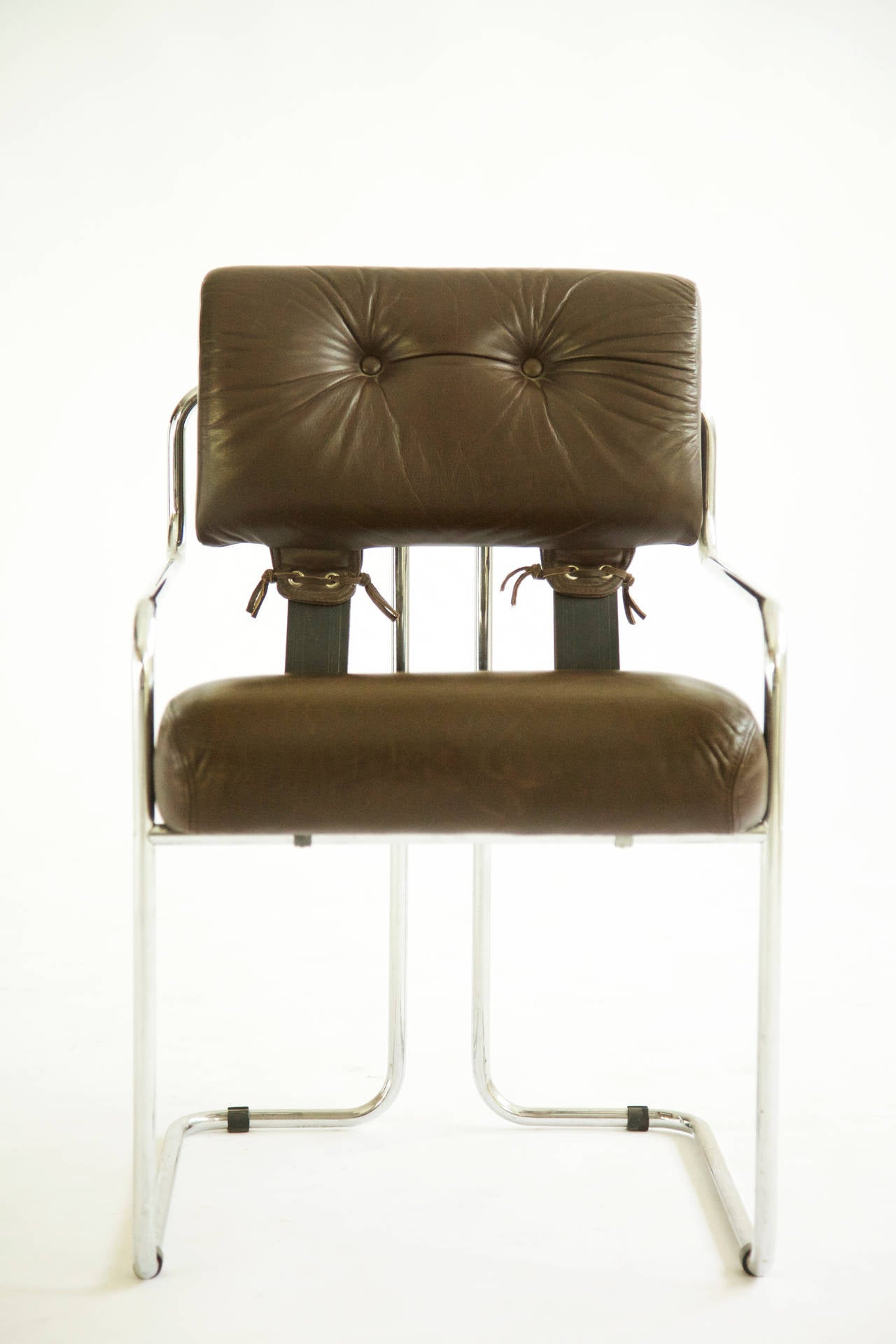 Guido Faleschini for Mariani/Pace Collection dining chairs.
Tubular chrome and brown leather seats and straps.