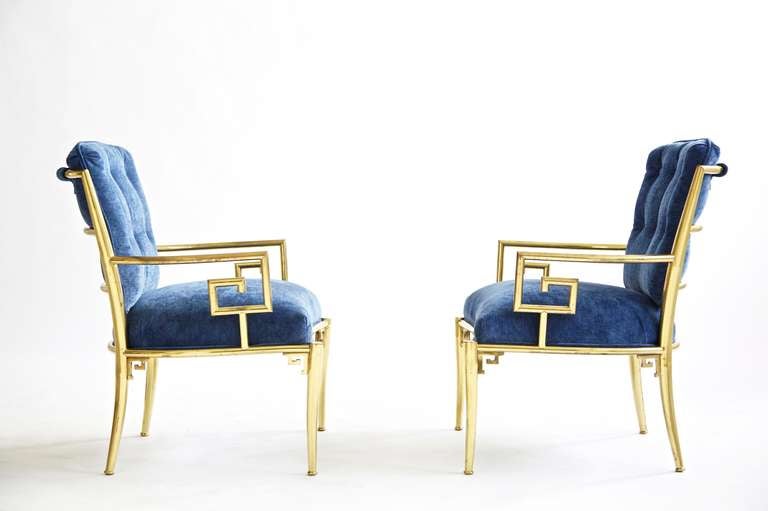 Brass Lounge Chairs by Mastercraft. 
Featuring curved back with Greek Key details. 
Reupholstered with Great Plains fabric.