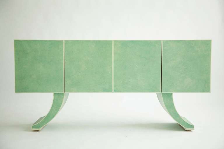 Baughman for Directional Customized for Lake Shore Drive Apartment by famed Chicago Interior Designer Richard Himmel.
Showing the entire case hand faux finish and splayed legs.