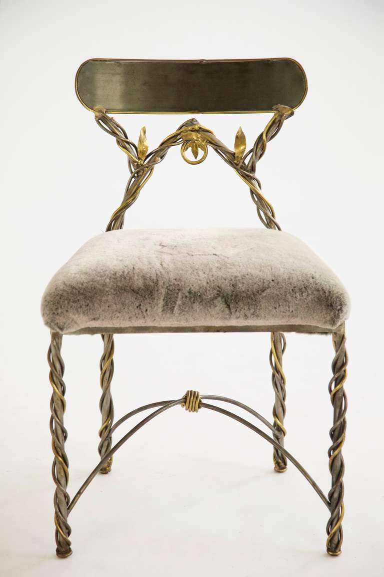 Villa Sculptural Art Chair, Wrapped with brass faux vines with leaf details using neo-classical design themes with references to Greek and Roman mythology. This functional art piece is hand-crafted in steel, brass.

Artist's Biography
Mario Villa