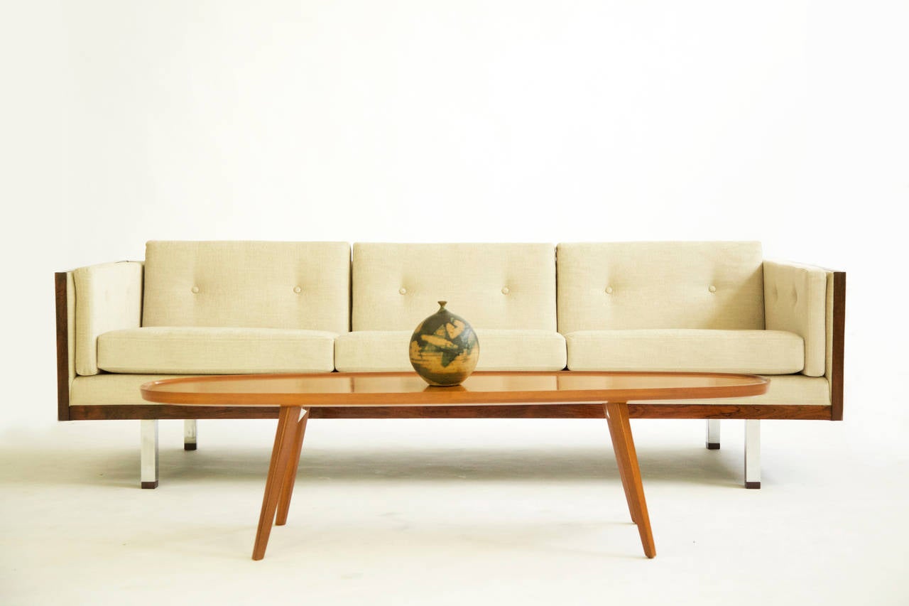 Baughman for Thayer Coggin cube sofa, reupholstered with great plains fabric cotton blend.
Beautiful figured rosewood graining.
Solid rosewood caps.
Outside arm height 24.75