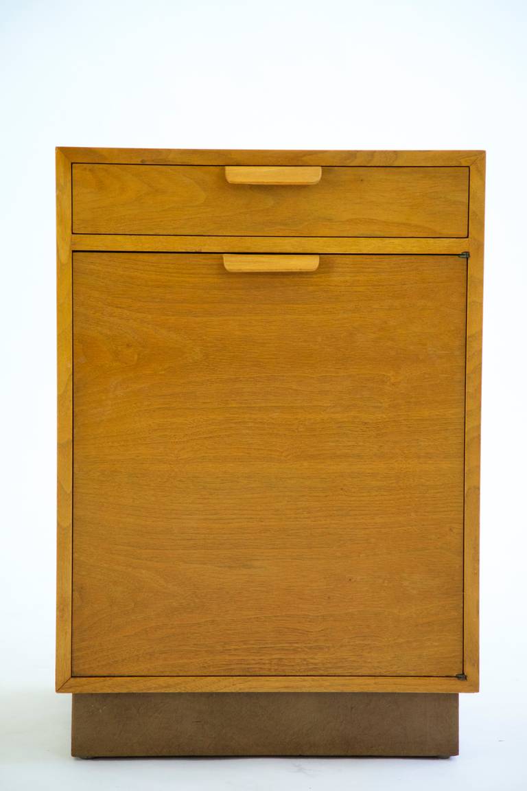 Edward Wormley for Dunbar, pair of nightstands, ends.
Features, laminated pulls mortised into the door and drawers.
Bleached cherry, leather wrapped plinth base.