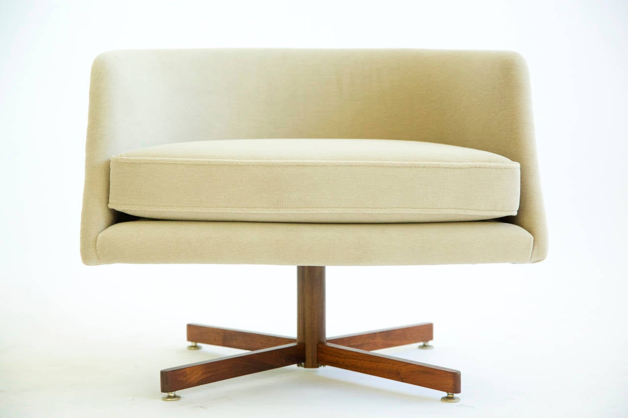 Baughman for Thayer Coggin, pair of swivel lounges, curved walnut highly figured veneer backs with mohair upholstery with Spinneybeck Haired Hide pillows.
Signed with applied paper manufacturer's label under each seat cushion of each example: