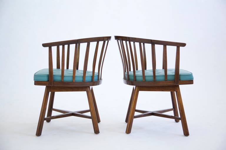 Wormley for Dunbar Janus Group, a pair of swivel chairs.
Multiple layers of walnut back members rail and seat.