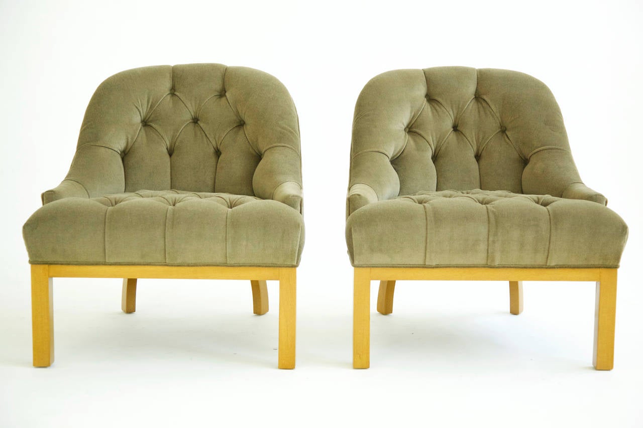Probber, tufted slipper chairs, solid mahogany legs with curved back legs, reupholstered with great plains mohair.