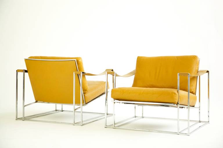 Baughman for Thayer Coggin pair of leather lounges, square tubes symmetrical designed with horizontal rails flush with floor.
Leather strapped arms, sling seat design, patented rubber sling for comfort.