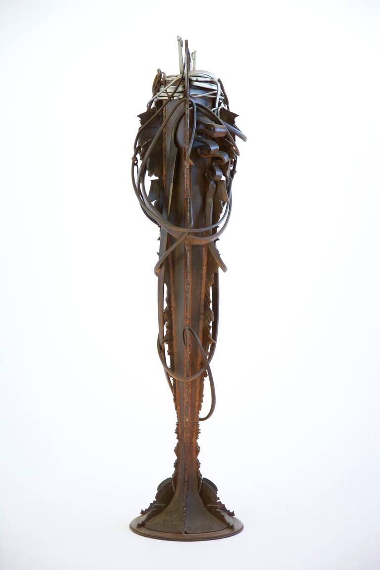 Albert Paley Studio, sculptural vase formed, forged, and fabricated of steel with a stainless steel insert. The work has been published in The Art of Albert Paley and in numerous catalogs for exhibitions. Small edition of 4
[Signed Paley 1993]