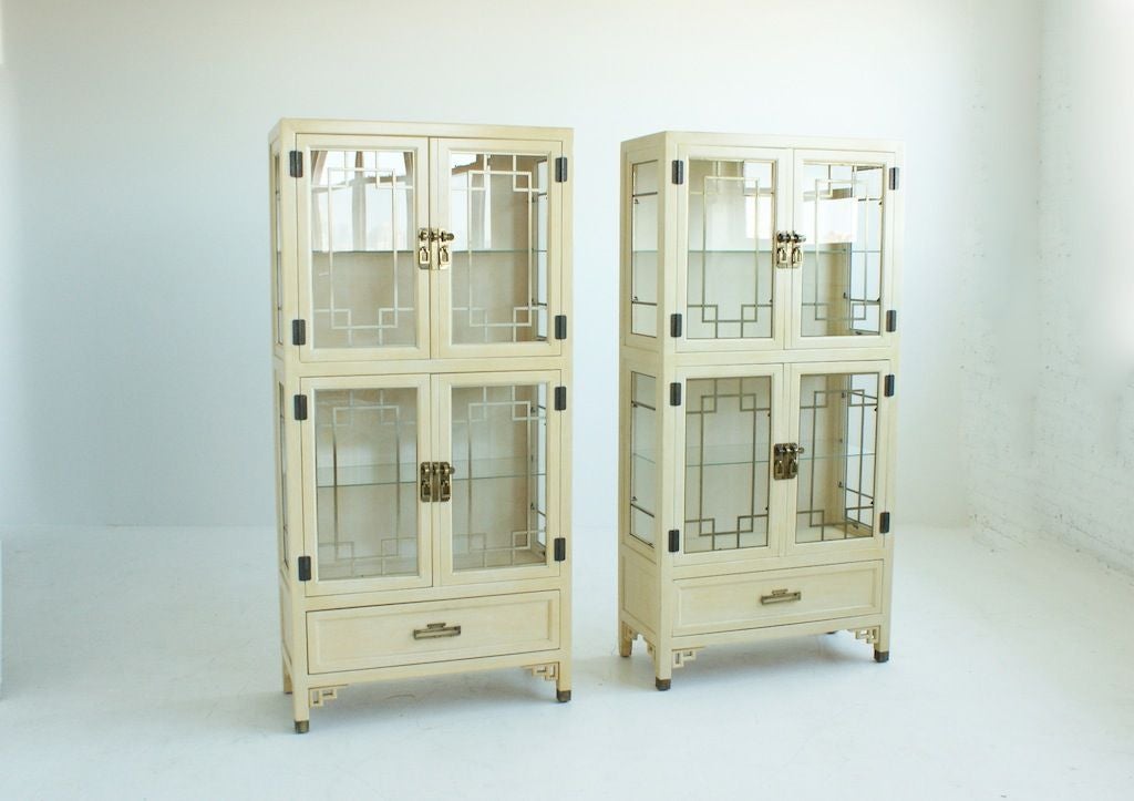 Pair of Chinas, CENTURY DESIGN, Cathay Collection, produced 1971 - 1977.  They are Item 45-421 in the frosted bamboo finish.  Four door with lower storage drawer, adjustable glass shelves. Cases have two lighting sources, upper and lower. Electrical