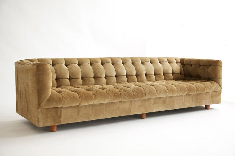 Bennett for Brickel, Suede Chesterfield sofa.
Contemporary dome arms, Tufted seat back and inner arms with buttons, pleated front.
Outside arm height 26
Inside arm height 12