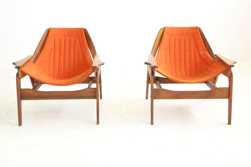 Johnson for Charlton Company, Pair of sling lounge chairs. Features scalloped arm details. Featured in Interiors and Domus magazine.