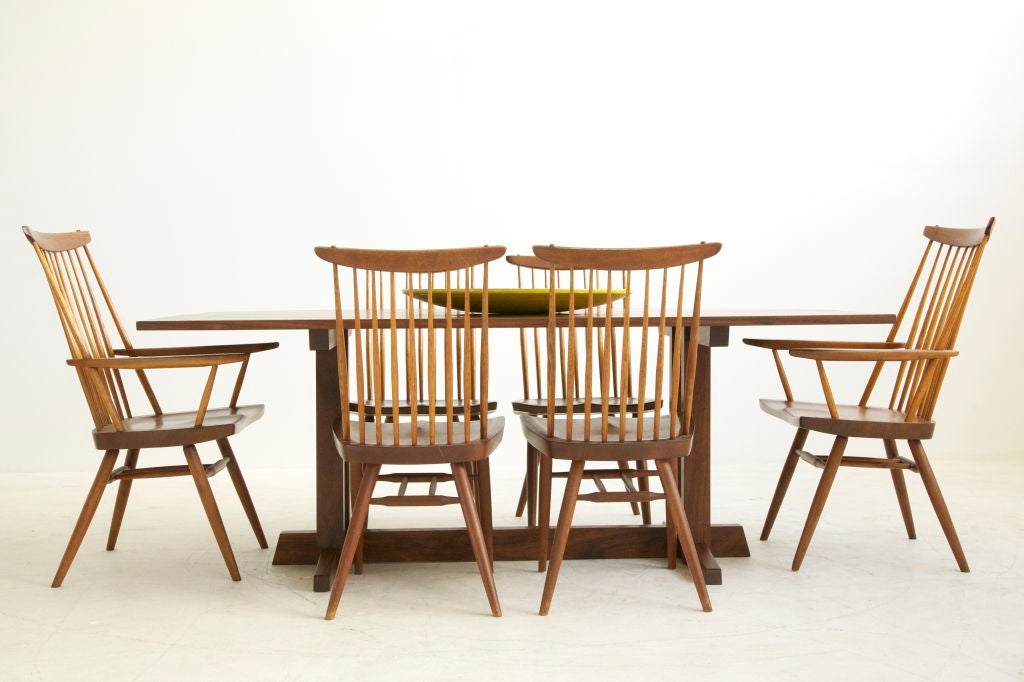 Nakashima Dining Set: 4 Armless and 2 Arm New Chairs, Dining Table in East Indian Laurel wood, a rare hard wood used for special clients, this one a NYC Architect.  Signed name underside with full provenance.
Chairs and table can be sold