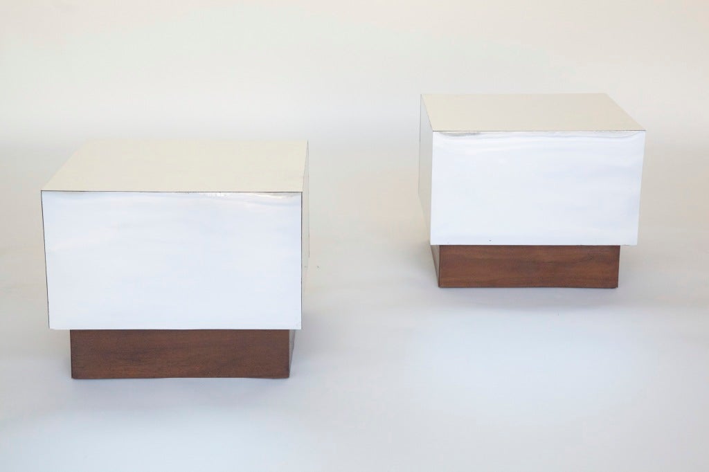 Milo Baughman for Directional. Pair of mirrored end tables on recessed walnut base.