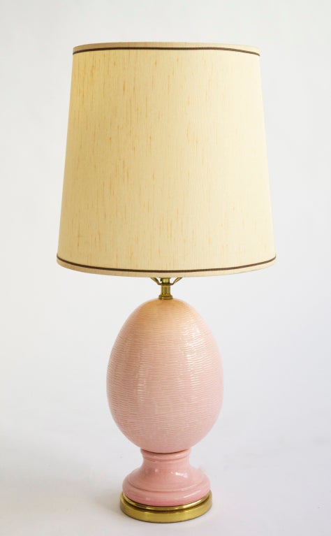 Lamps, pink pineapple shape with vertical bands, brass base.