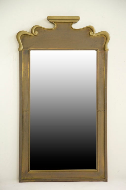 Solid antiqued brass mirror.