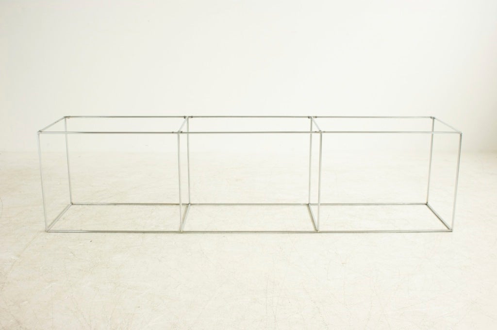 Horizontal tubular frame, sturdy to hold 3 Carrara marble slabs, sofa table or wall unit.