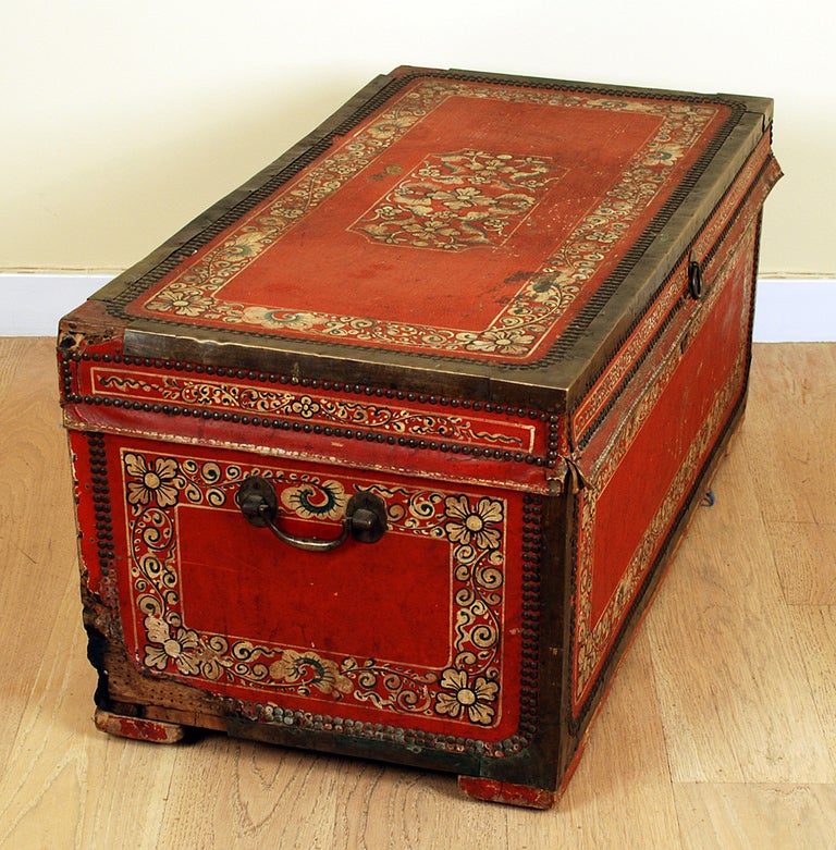 A good mid 19th century China trade camphor wood chest made for the Mexican market. Hand painted leather with brass trim and studded brass nail heads. Overall with excellent wear and surface patina. 

Dimensions: 32 inches long x 15 inches deep x