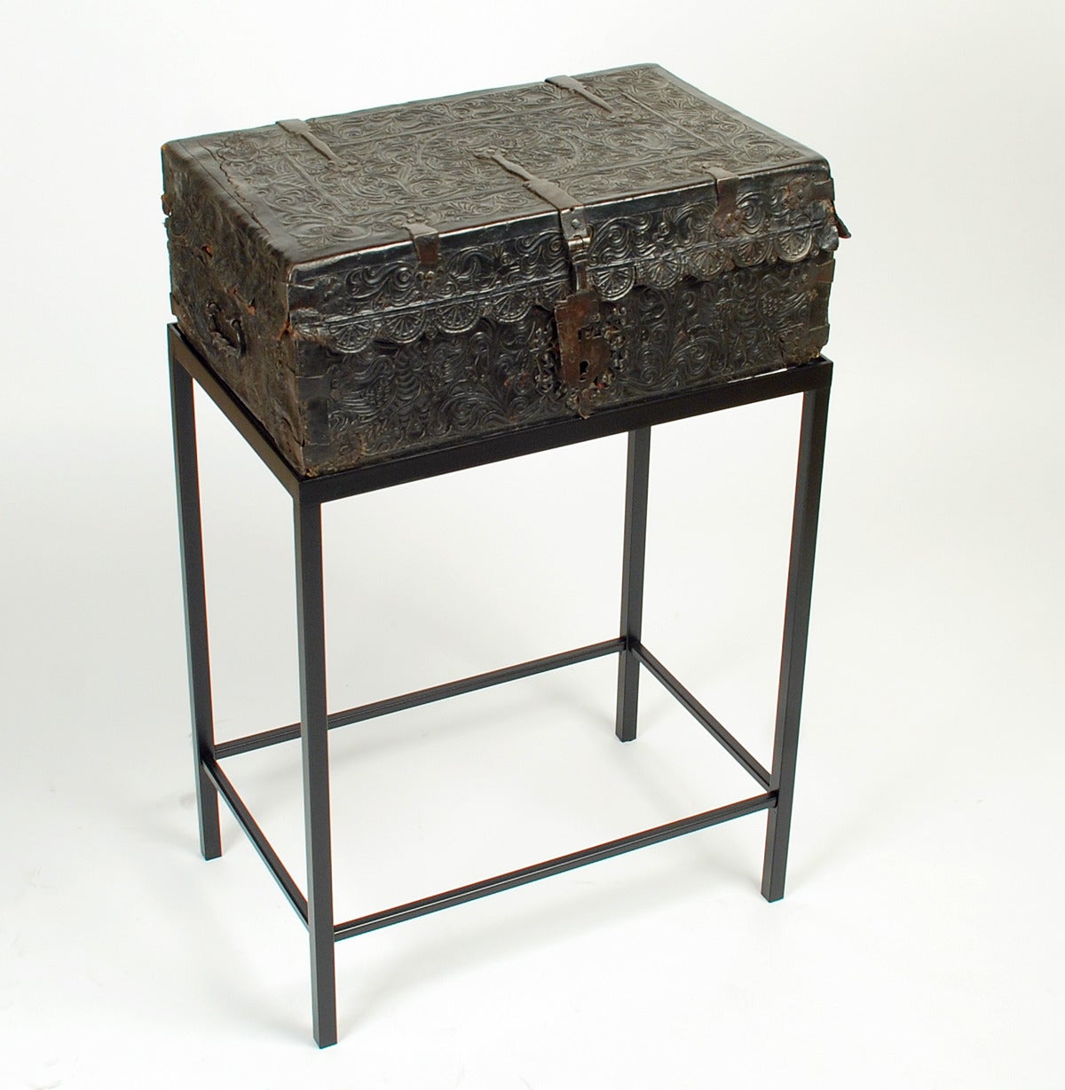 A superb early 18th century hand tooled and embossed leather Spanish Colonial petaca (document box) with beautiful hand-forged iron hasp, hinges and lock-plate. Overall with a rich and lustrous surface patina. The interior lined in very early
