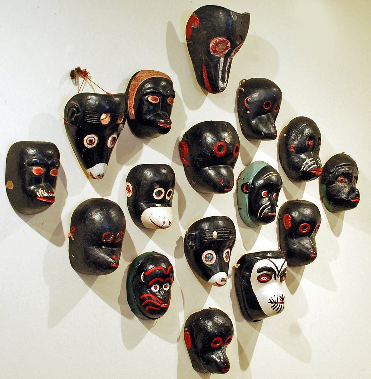 From a Tucson, Arizona collector, his lifetime collection of 16 outstanding early 20th century Guatemalan 'mico' and 'monkey' masks, used in the 'Costeño' and 'Baile de los Animales' Dances, circa 1930s and 1940s. Some with 'moreria' marks on