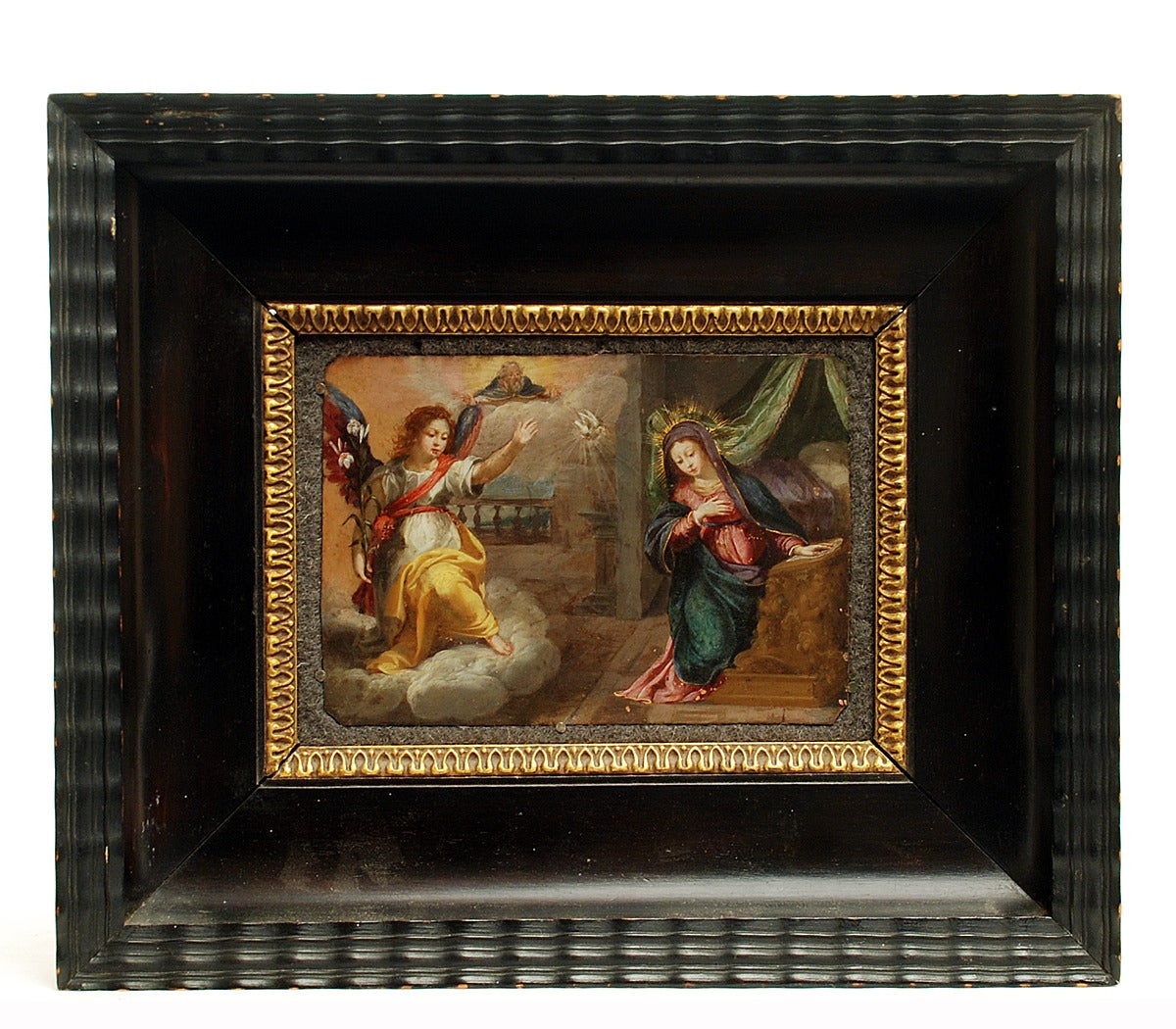 A stunning 17th century Italian Renaissance period oil on copper, 'The Annunciation of the Blessed Virgin Mary.' The Annunciation is a celebration of the announcement by the Archangel Gabriel to the Virgin Mary that she would conceive and become the