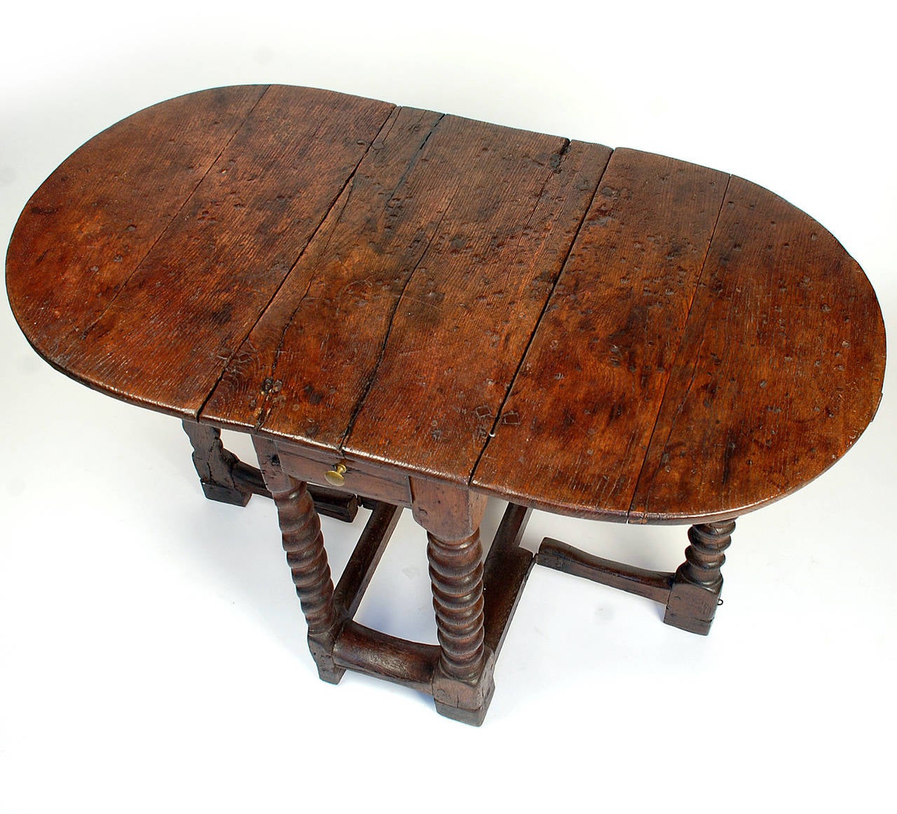 Rare Early Spanish Chestnut Gate-Leg Table For Sale 1