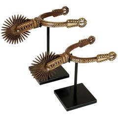 A Pair of Large Antique Argentine Silver Overlaid Gaucho Spurs