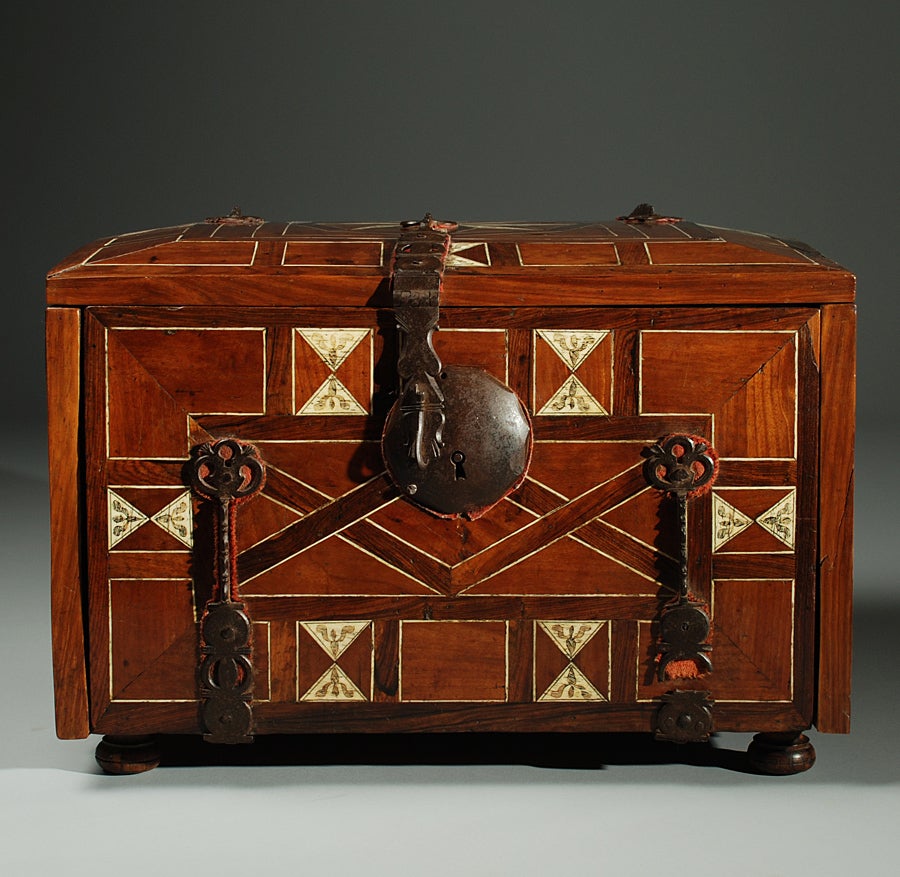 A superb 17th century Spanish colonial fruitwood 'escribania' with finely crafted mahogany, cedar and bone marquetry inlay, hand etched sgraffito and original hand forged iron hinges, hasp and lock-plate, all backed with original red felt. The