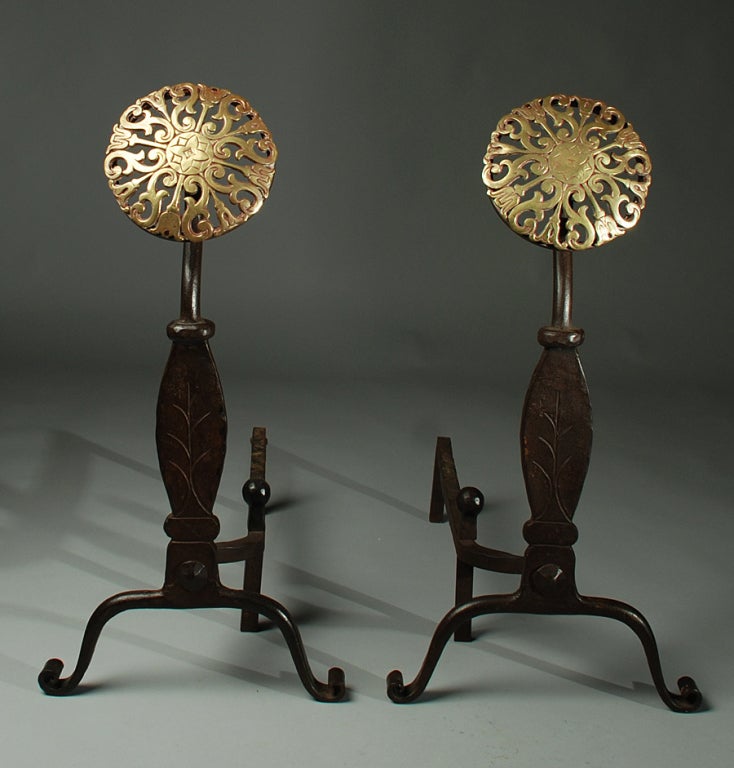 A pair of large and impressive 18th century Spanish colonial hand forged andirons with beautiful hand chased bronze finials - Mexico, circa 1780.

Dimensions: each andiron measures 22 inches long x 12.5 inches wide x 24.25 inches high. 

In