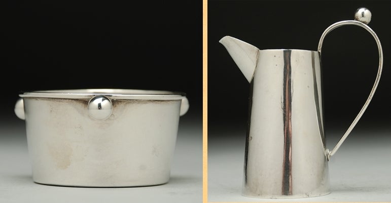 Mid century Mexican sterling silver creamer and sugar bowl by William Spratling. Both items fully marked. Purchased directly from William Spratling in Taxco in early 1960's. 

Dimensions:  creamer measures 3.5 inches high. Sugar bowl measures