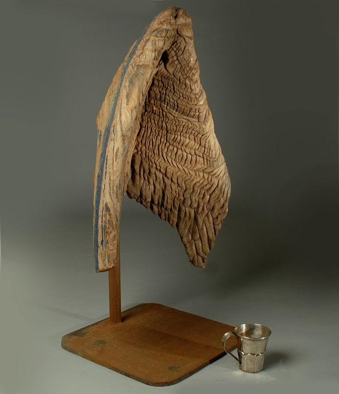 A large and impressive Afro-Mestizo hand carved wooden canoe prow from the 'Laguna de Chacua' along the southeastern coast of Mexico - circa 1900. Beautiful knotty burl wood with remnants of blue paint. Displayed on a custom made stand.

** The
