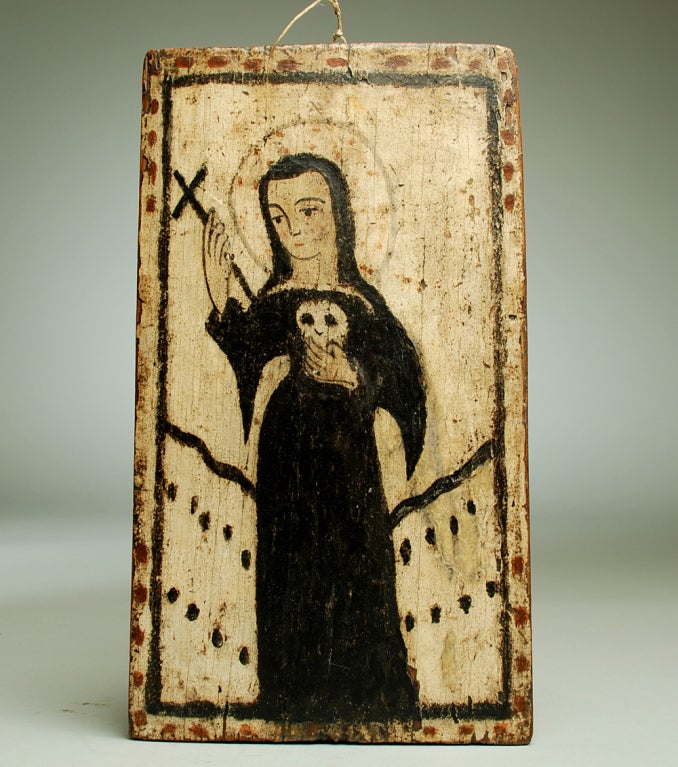A superb 19th century New Mexican retablo - Santa Rita de Casia, patroness saint of lost and impossible causes. Oil on hand adzed wooden tablet. Attributed to one of New Mexico's most important 19th century painters -- Jose Aragon (circa 1830).
