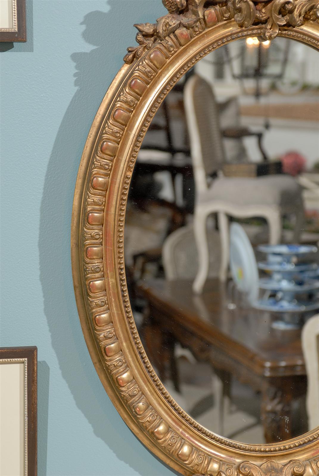 Pair of 19th Century Rococo Revival Oval Giltwood Mirrors In Excellent Condition In Atlanta, GA